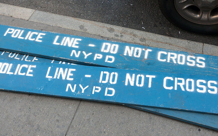 wooden police barricades in the city of new york. Advertising CBD. CBD marketing. CBD SEO.