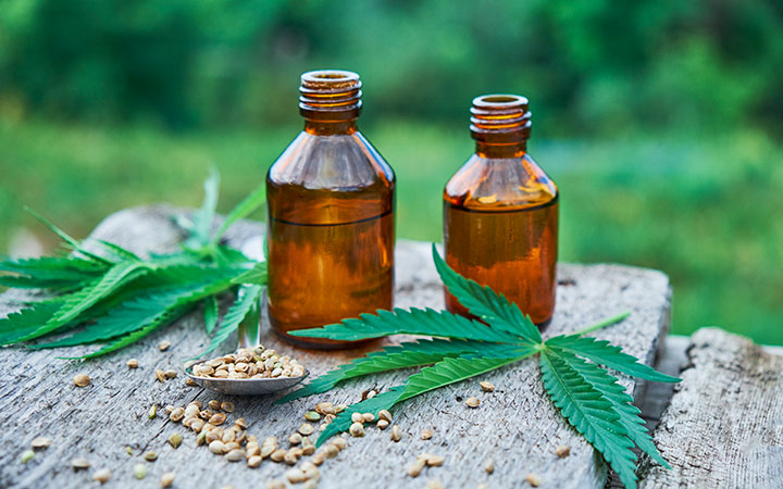 hemp leaves and cbd cannabis oil display for cannabis programmatic advertising